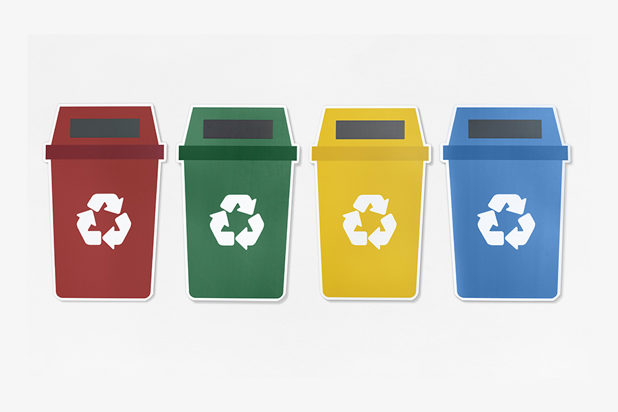 Set of trash bins with recycle symbol